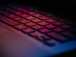 a-close-up-of-a-keyboard-with-a-blurry-background