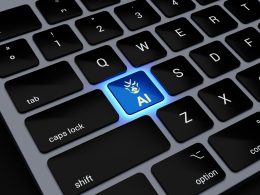 a computer keyboard with a blue light on it