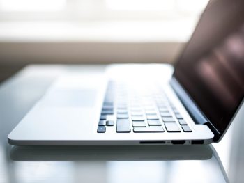 shallow-focus-photography-of-macbook