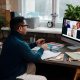 teacher-video-calling-with-his-students-using-a-computer
